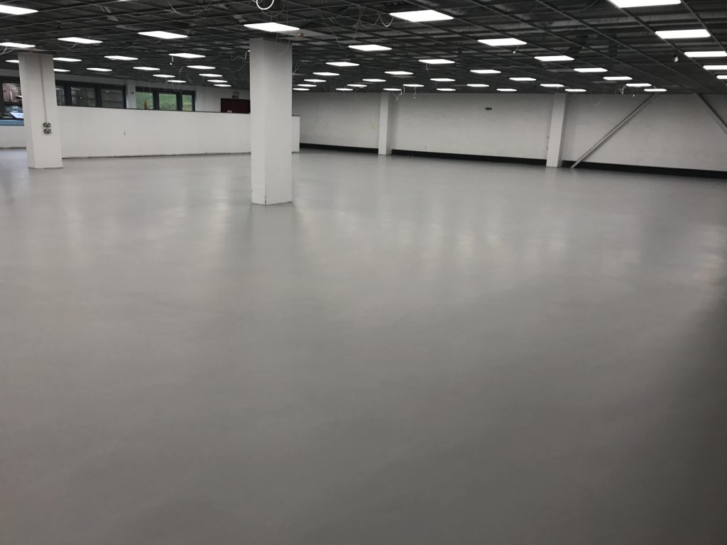 resin floor in an empty warehouse